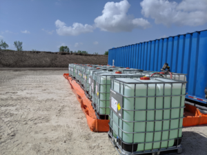 ACME's Aluminum Angle Berm deployed as a secondary containment measure for chemical storage tanks