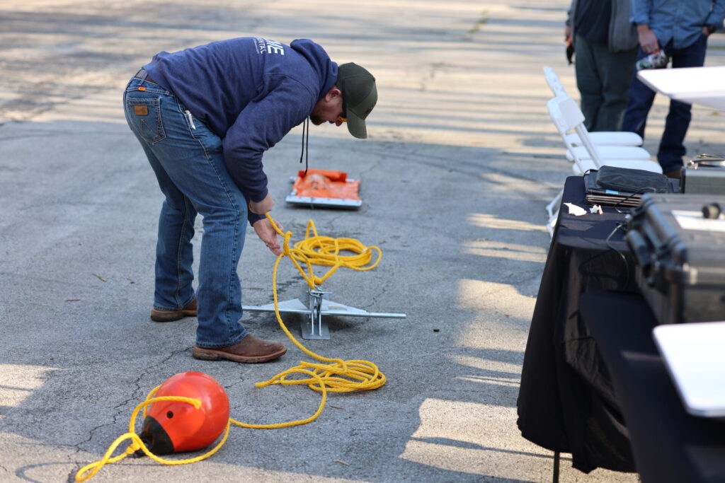 Preparing midstream anchor systems for containment boom deployment