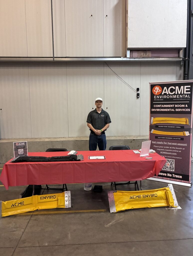ACME representative at the 2025 WSCGA Field Day & Trade Show showcasing our Cranberry Boom