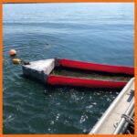 20" offshore containment boom preventively anchored to a buoy