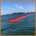20" Offshore containment boom preventively deployed in an accordioned position for easy connect and pull