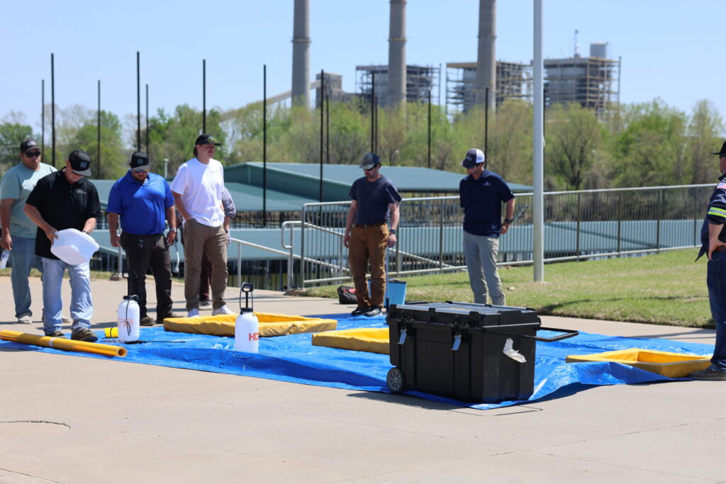 Students learning how to set up a decontamination site after an oil spill response