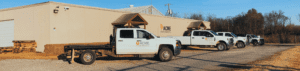 Photo of ACME Environmental building and truck fleet
