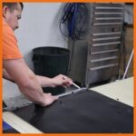 Perma Boom coupler location being drawn onto the pvc material