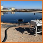 Oil drum skimmer connected to pump to recover oil quickly